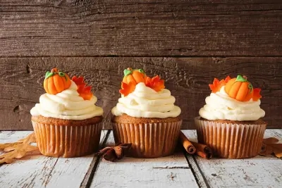 These s awesomely autumnal Pumpkin Cupcakes are an ideal way to use your pumpkin guts into something special.