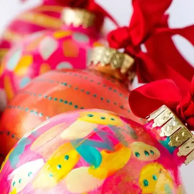 An easy way to put your own spin on the Christmas tree, refresh your old baubles with a bit of paint!