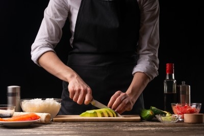 A chef prepares some ingredients