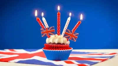 A Cupcake Decorated With Union Jack Flags